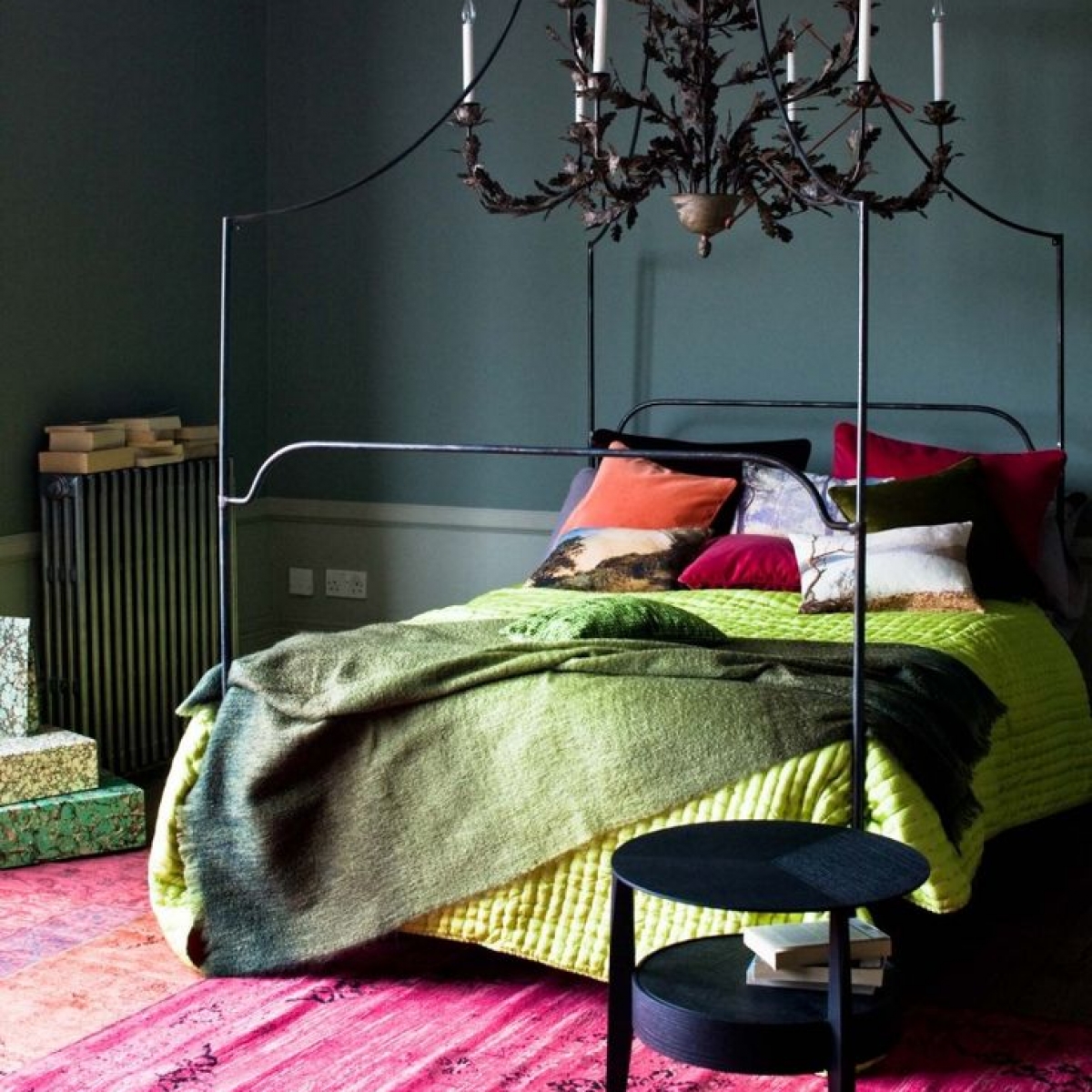 dark moody bedroom with bright green and red accents