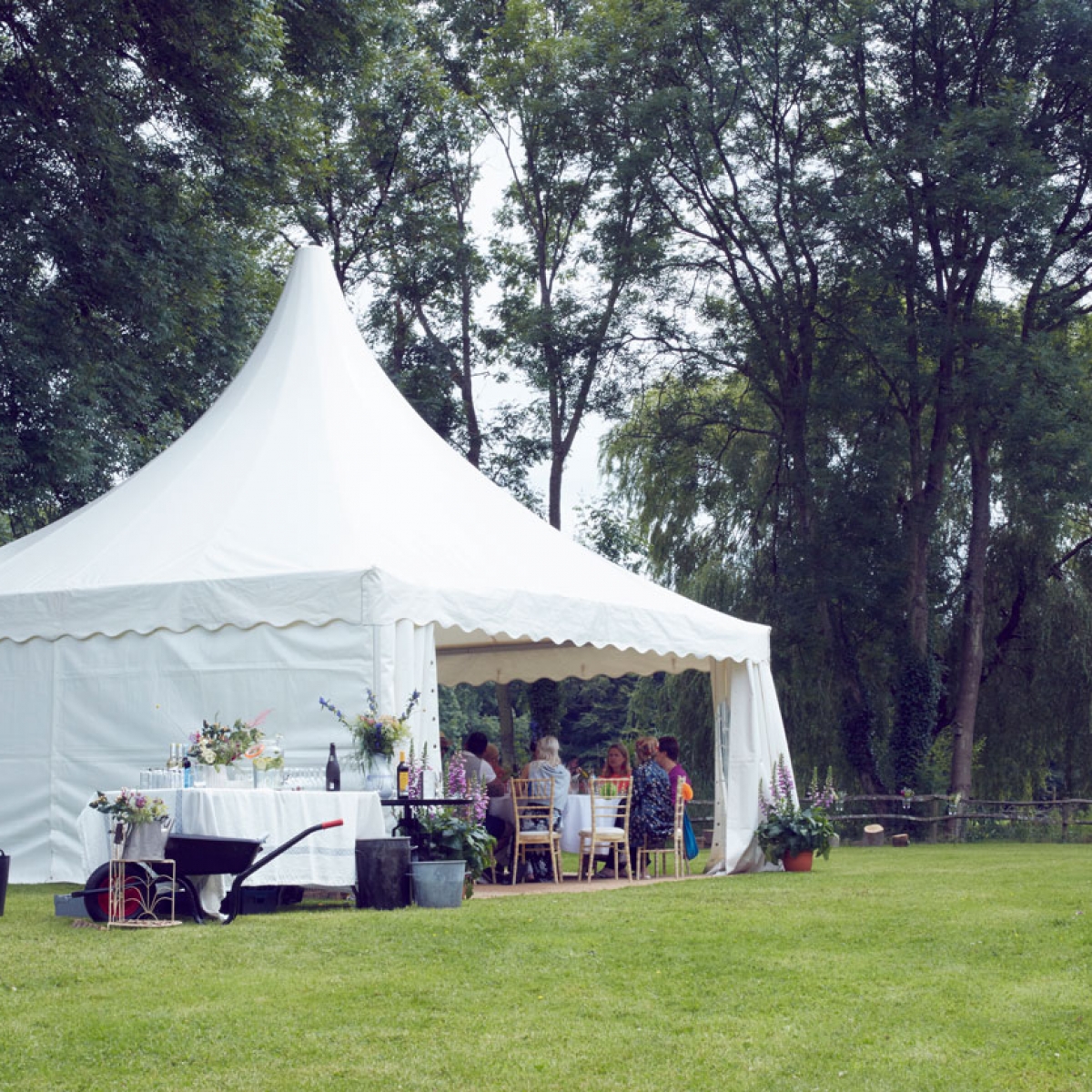 Summer garden party marquee is the perfect size for a realxed summer garden party. The chinese hat marquee seats up to 30 people easily