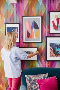 interior designer sophie robinson shows how you create a gallery wall of artwork for your interior design scheme