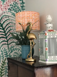gold flamingo ornament adds a quirky charm to a botanical theme