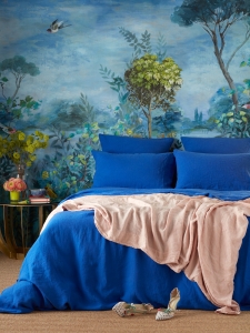 Sophie Robinson designs a range of bedlinen for the Secret Linen Store - dazzling blue and painterly mural background