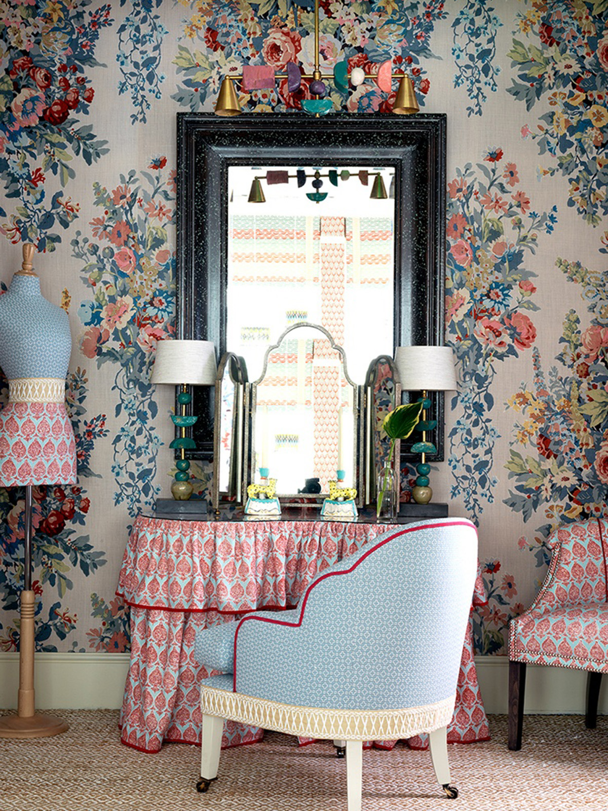 When planning a dressing room it's the perfect opportunity to explore your maximalist tendancies so go for big printed wallpapers, lush furnishings, and oversized dressing mirrors. This room designed by Kit Kemp is a feminine boudoir. To find out more about how to design a dressing room listen to The Great Indoors Podcast with Kate Watson Smyth and interior deisgner Sophie Robinson