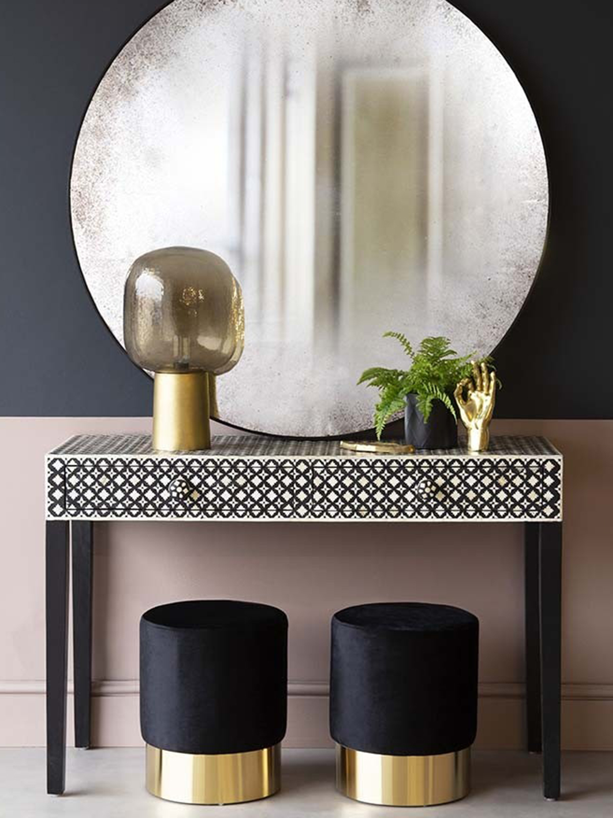 Interior Designer Sophie Robinson advises on how to make small spaces appear bigger. Reflective surfaces will bounce the light around the room, which helps to make it feel lighter and more spacious
