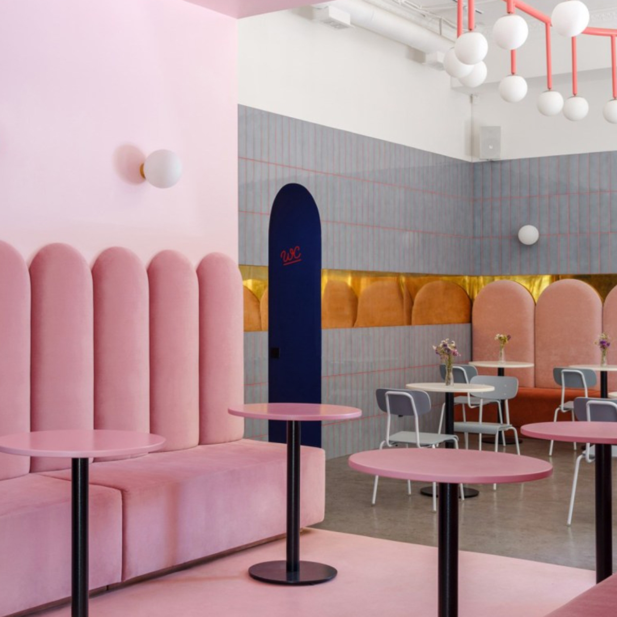 The confident colour platte of bubblegum pink, bold blue and gold interior of the new BreadWay bakery in central Odessa, Ukraine. #sophierobinson #cafe #bakery #cafeinterior