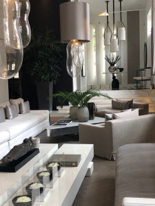 Home of interior designer Kelly Hoppen with open plan living space and entrance in her signature taupe. For the full house tour listen to the Great Indoors podcast with Sophie Robinson and Kate Watson Smyth. #openplan #sophierobinson #kellyhoppen