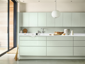 The Dulux Colour of the Year has been announced as Tranquil dawn. A soft, grey-green whihc is aimed to create a feeling of calm, is a versatile choice on a modern kitchen and works well with the black sliding patio doors. #dulux #sophierobinson #tranquildawn