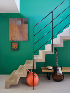 Interior Designer Sophie Robinson takes a look at the new paint collection by Farrow & Ball and the Natural History Museum. The Verdigris Green is used in the entrance hall with a modern black metal bannister yet creates a welcoming space. #sophierobinson #farrowandball #entrancehall