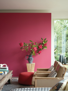 Farrow & Ball launch a new paint collection in conjunction with the Natural History Museum. The Lake Red colour is a classic tone and is brought up-to-date with modern wooden living room furniture and a focal floral display. Sophie Robinson looks at overall collection, find out more here #farrowandball #sophierobinson #livingroom