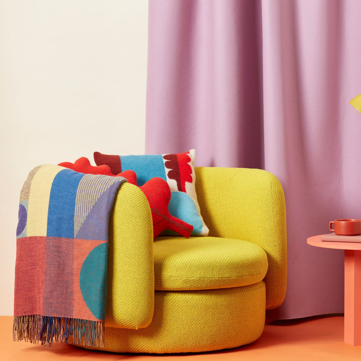 Colour lover and Interior designer Sophie Robinson looks at ways of boosting the mood in your home through colour. Adding accents of bright colours like a yellow armchair and accessorising with patterned throws and cushions will instantly brighten the mood. #colourlover #sophierobinson
