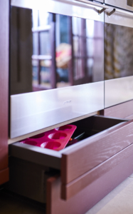 A discreet plinth drawer under the oven which holds baking trays.